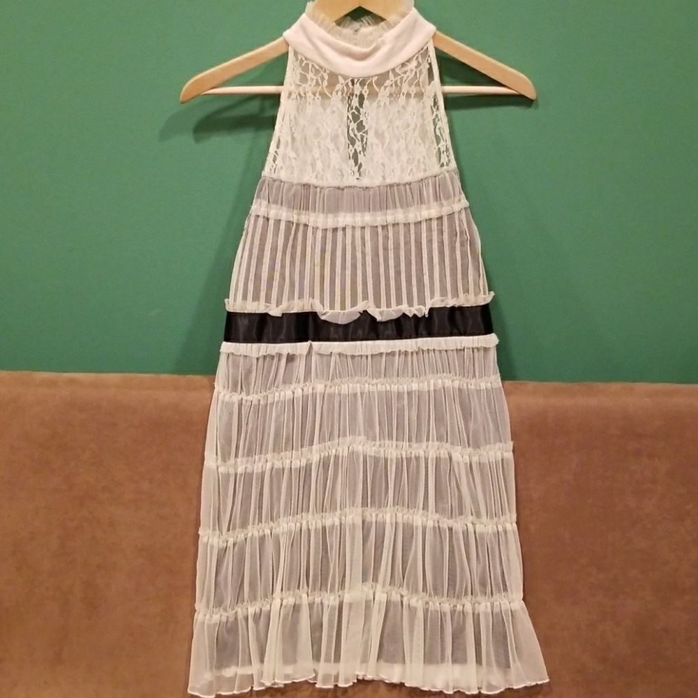 Black, cream lace top OR dress.